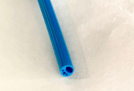 What is the role of a common medical device, the PTFE multi-lumen gastric tube